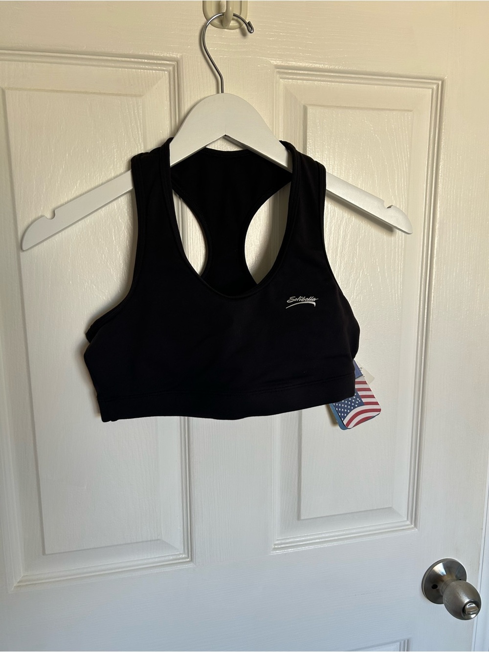 Black Racerback Sports Bra with Subtle Logo